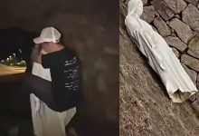 Captura de video con una persona junto a una figura blanca y la estatua de la Virgen María vandalizada en el suelo en Francia
